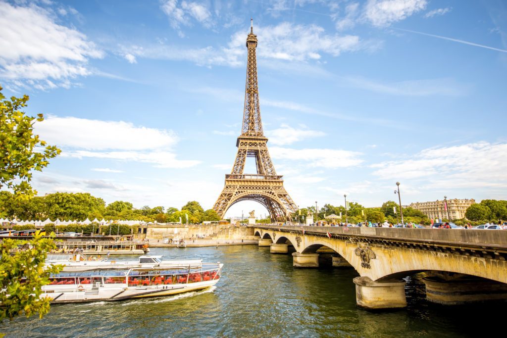 View on the famous Eiffel tower with Seine river and bridge in Paris